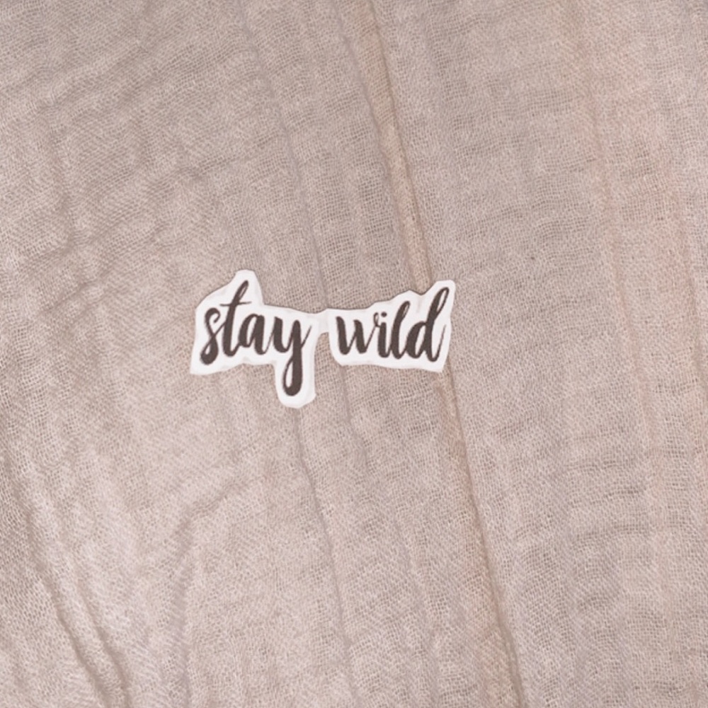 “Stay wild” sticker